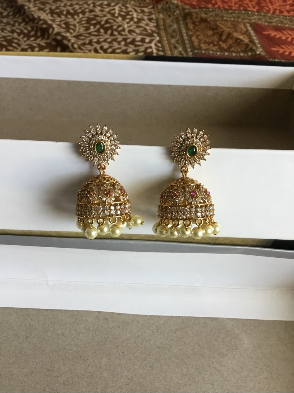 Gold Pearl Jhumka Earrings with Green Stone Accent - Women Jewelry